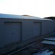 Two doors Roller Doors hung at Kings Lynn Speedway "STARS" NORFOLK ARENA, Gutters & flashing not fitted yet in this pic.