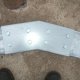 Apex brackets are bolted into place. We tend to add a couple of Tek screws just to ensure that there is no movement during the process.