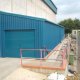 Here we have built onto the main sports hall a steel sports equipment storage area in ocean blue to match the existing school colours.