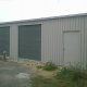 Hill Large Double OZ-UK Steel Building Double Garage & Workshop EAST SUSSEX, Merlin Grey Door Roof & Trim and Goosewing Grey walls.